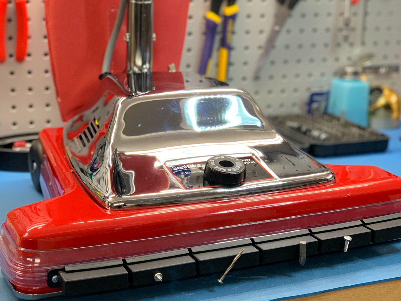 red commercial vacuum cleaner after repair